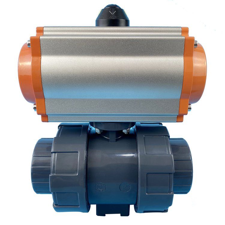 How does a pneumatic actuator drive a ball valve